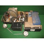 Two boxes of oil cans, spanners, socket sets, Wipac lamps,