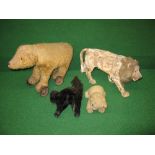 A group of stuffed animals to include a Chad Valley bear, an unnamed black cat,