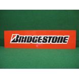 Modern thick aluminium advertising sign for Bridgestone with black letters on a red and white