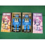 Two Star Strider battery powered tinplate robots with rotating bodies,