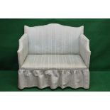 Edwardian two seater settee having arched rectangular back with straight arms and stuff over seat,