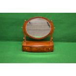 Mahogany swing frame toilet mirror having oval mirror supported on shaped uprights leading to three