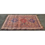 Brown ground rug with blues,