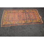 Red ground rug with blue,