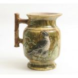 A Majolica Jug decorated with Birds