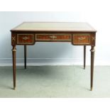 A French Mahogany Writing Table with ree