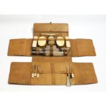 A Gentlemans Leather Valet Case containi