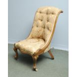 A Victorian Nursing Chair in Walnut Fram