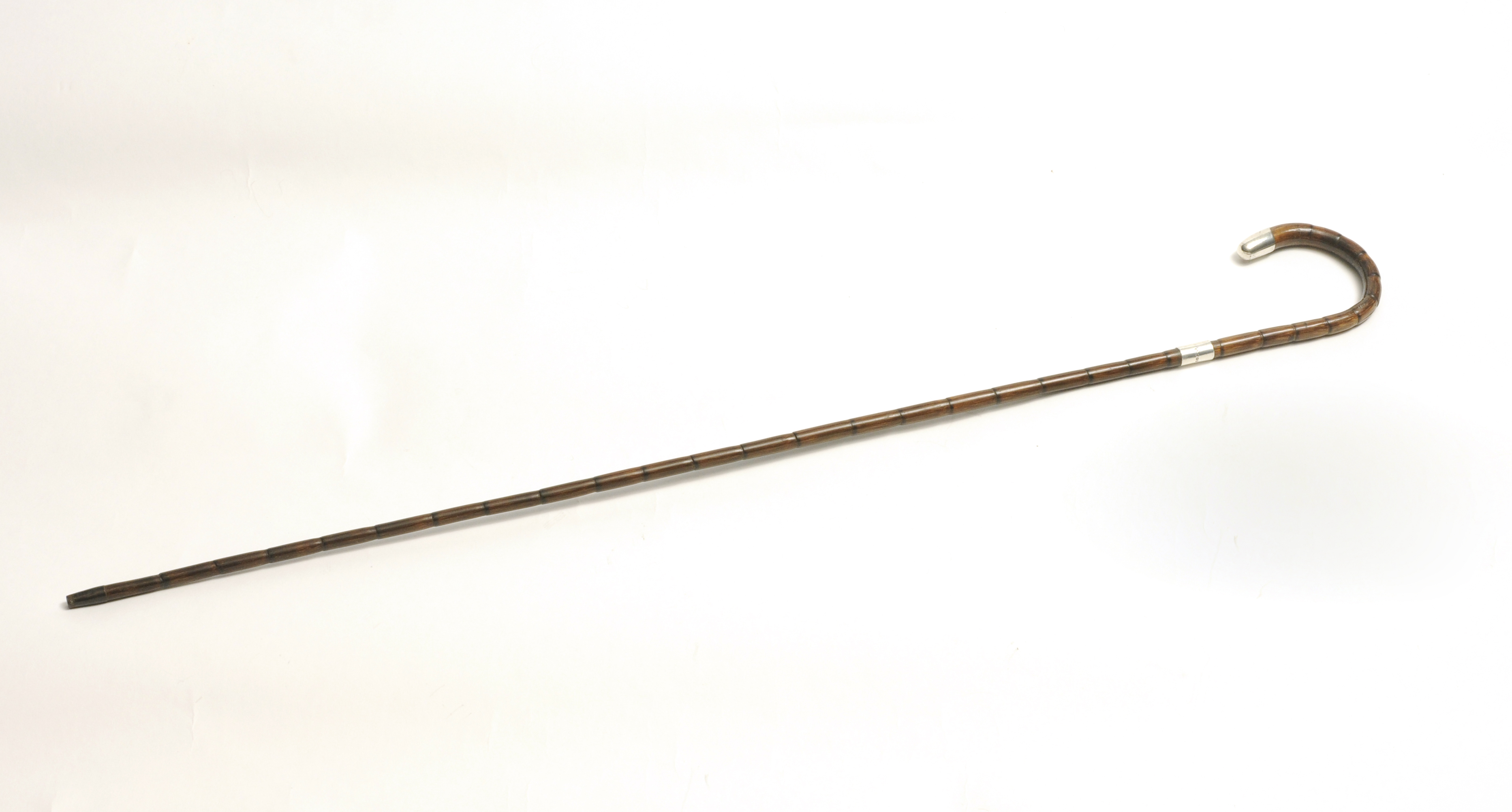 A Bamboo Walking Cane with Silver band a