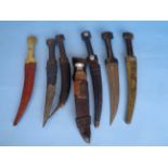 A Collection of 7 Middle Eastern Daggers