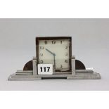 An Small Art Deco Metal Clock