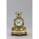 A 19th century French Gilt Brass Mantle Clock