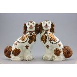 A Pair of Copper Lustre Spaniel Mantle Dogs, size 1
