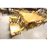 Pine Dining Table together with Six Pine Chairs (including two carvers)