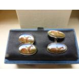 A Pair of Boxed Silver and Enamel Double Cufflinks each panel depicting Race Horse and Jockey