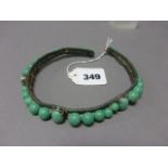 Green Choker Necklace set with three white metal mounted oval jade panels and thirty eight jade