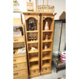 A Pair of Pine Tall Bookcases with single drawer at base