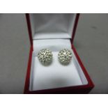 A Pair of Ball shape Earrings set with CZ's