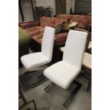 A Pair of Modernist White Leather Zig Zag Chairs