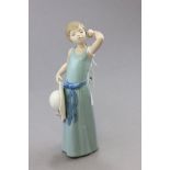 A Lladro Figurine with Bonnet