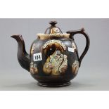 A Victorian Bargeware Teapot one side with panel 'Werrington 1879' and the other 'Mrs J Merredeth'