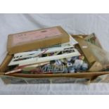 Box of model kit accessories including many paints, spares, part kits etc