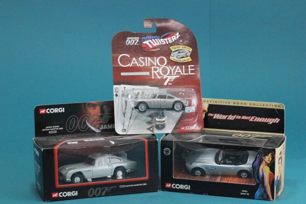 Three boxed Corgi James Bond 007 die cast vehicles including 04303 Aston Martin DB5, 05001 BMW Z8