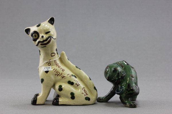 A Torquayware Motto Cat together with another Green Glazed Pottery Cat