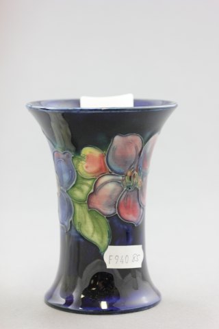 A Moorcroft Vase, Anemone pattern on blue ground