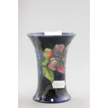 A Moorcroft Vase, Anemone pattern on blue ground