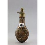 A 19th century Copper and Brass Powder Flask Art Nouveau Embossed Decoration