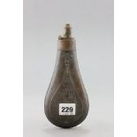 A 19th century Copper and Brass Powder Flask with embossed panel decoration