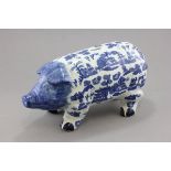 A Large Willow Patterned Ceramic Pig Moneybox