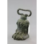 An Antique Cast Iron Door Stop in the form of a Lions Paw