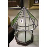 A Terrarium with wooden base and leaded glass