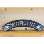 A Cast Iron Arched 'Michelin' Sign