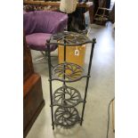 A Four Tier Cast Iron Pot Stand