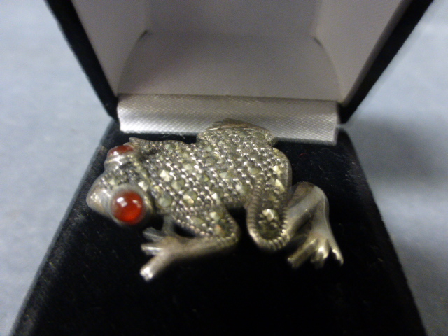 A Vintage Marcasite Frog Brooch with red glass eyes