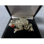 A Vintage Marcasite Frog Brooch with red glass eyes