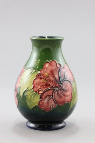 A Moorcroft 'Hibiscus' Vase on green ground