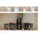 A Vallauris Pottery Water Set comprising Jug and Six Beakers each with different colour interior and