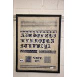 A Framed and Glazed Sampler dated 1911