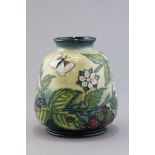 A Moorcroft Vase, Fruit Garden Pattern