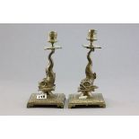 A Pair of Brass 'Fish' Candlesticks