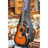 An Encore Acoustic Guitar with case/bag