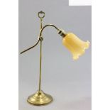 A Brass Adjustable Table Lamp with Glass Shade