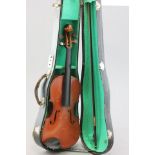 A Three Quarter Violin in case with bow