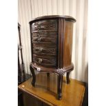 Hardwood Oval Cabinet with Four Drawers
