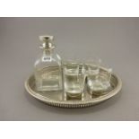 Contemporary Square Glass Decanter together with Four Glass Whiskey Tumblers on White Metal Stands