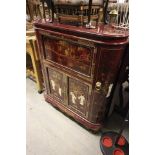 An Oriental Red Lacquered Drinks Cabinet with inlaid and mother of pearl decoration depicting